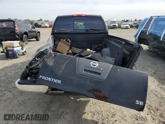 2009 Nissan Frontier SE with VIN 1N6BD06T09C409087, listed as a Copart auction lot 52325915 with 190,970 mi miles and Salvage title. Bid and sale history available at DreamBid. Image 6.