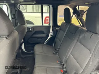 2023 Jeep Wrangler Sahara with VIN 1C4HJXENXPW586579, listed as a IAAI auction lot 41795621 with 34,433 mi miles. Bid and sale history available at carsss.com. Image 8.