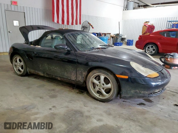 1999 Porsche Boxster z VIN WP0CA2988XU623383, wystawiony jako Copart lot #60567895 z przebiegiem Nie podano mil oraz Czysty tytuł • Clean title. Historia ofert i sprzedaży dostępna na DreamBid. Obrazek 4.