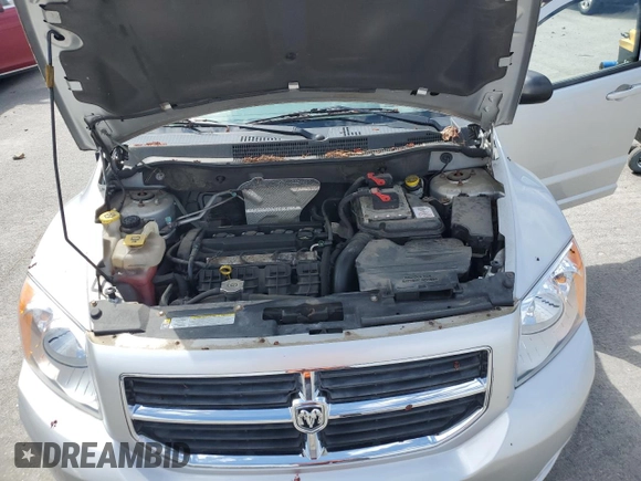2012 Dodge Caliber SXT with VIN 1C3CDWDA2CD535730, listed as a Copart auction lot 55927895 with 67,391 mi miles and Clean Title. Bid and sale history available at DreamBid. Image 11.