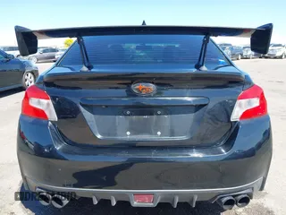 2015 Subaru WRX Limited with VIN JF1VA1G67F8809515, listed as a IAAI auction lot 42003173 with 112,414 mi miles. Bid and sale history available at carsss.com. Image 16.