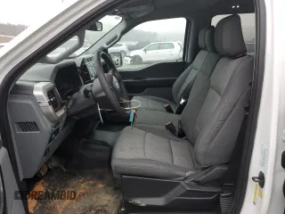 2023 Ford F-150 XL with VIN 1FTFW1E86PKG13350, listed as a Copart auction lot 87603215 with 12,534 mi miles and Salvage title. Bid and sale history available at DreamBid. Image 7.