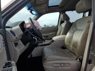 2010 Honda Pilot Touring with VIN 5FNYF3H81AB016255, listed as a Copart auction lot 71052644 with 96,847 mi miles and Salvage Title. Bid and sale history available at DreamBid. Image 7.