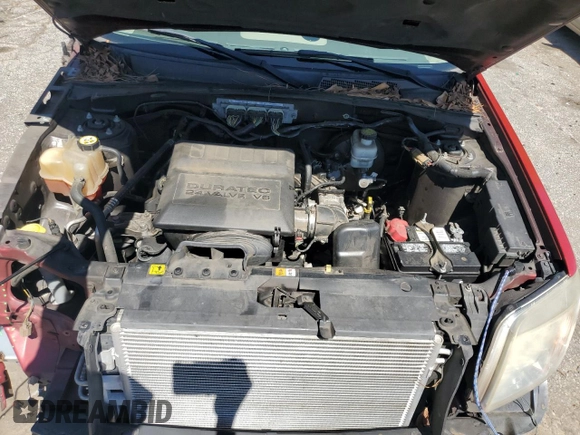 2011 Mercury Mariner Premier with VIN 4M2CN8HG0BKJ08313, listed as a Copart auction lot 57630215 with 188,818 mi miles and Salvage title. Bid and sale history available at DreamBid. Image 11.