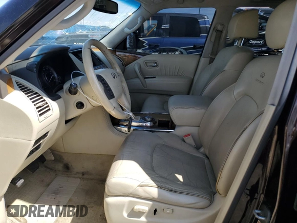 2012 Infiniti QX56 8-passenger with VIN JN8AZ2NC4C9317535, listed as a Copart auction lot 69211014 with 157,117 mi miles and Clean Title. Bid and sale history available at carsss.com. Image 7.