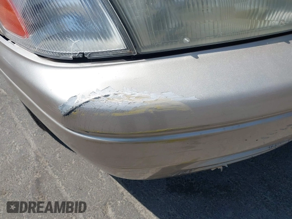 1999 Toyota Camry LE z VIN JT2BG22K1X0369726, wystawiony jako IAAI lot #42354218 z przebiegiem 213 828 mil mil oraz . Historia ofert i sprzedaży dostępna na DreamBid. Obrazek 13.