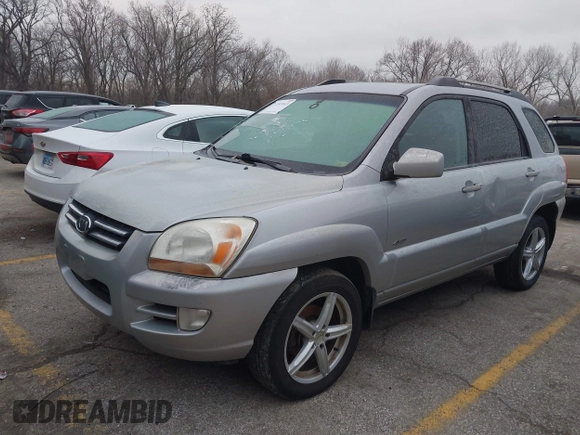 2005 Kia Sportage LX with VIN KNDJE723257071317, listed as a IAAI auction lot 41547643 with 267,610 mi miles and . Bid and sale history available at carsss.com. Image 2.