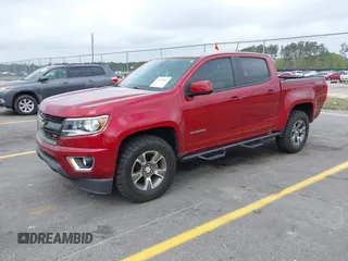 2020 Chevrolet Colorado 4WD Z71 with VIN 1GCGTDEN3L1132444, listed as a IAAI auction lot 41898911 with 65,493 mi miles and . Bid and sale history available at DreamBid. Image 2.