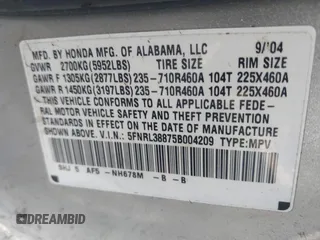 2005 Honda Odyssey TOURING with VIN 5FNRL38875B004209, listed as a IAAI auction lot 42003057 with 242,794 mi miles. Bid and sale history available at carsss.com. Image 9.