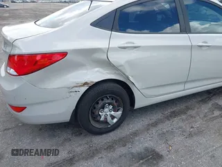 2016 Hyundai Accent SE z VIN KMHCT4AE4GU110456, wystawiony jako IAAI lot #42203494 z przebiegiem 97 409 mil mil oraz . Historia ofert i sprzedaży dostępna na DreamBid. Obrazek 12.