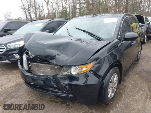 2016 Honda Odyssey EX-L with VIN 5FNRL5H65GB093937, listed as a IAAI auction lot 41691669 with 264,960 mi miles and . Bid and sale history available at DreamBid. Image 6.