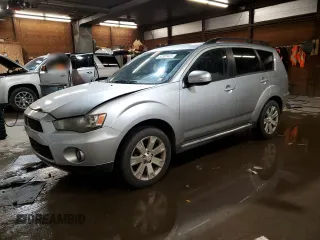 2011 Mitsubishi Outlander SE z VIN JA4JT3AWXBU019838, wystawiony jako Copart lot #57207425 z przebiegiem 199 797 mil mil oraz Szkoda całkowita • Salvage title. Historia ofert i sprzedaży dostępna na DreamBid. Obrazek 1.