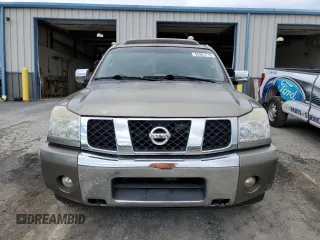 2006 Nissan Armada LE z VIN 5N1AA08B76N710950, wystawiony jako Copart lot #55981715 z przebiegiem 242 233 mil mil oraz Szkoda całkowita • Salvage title. Historia ofert i sprzedaży dostępna na DreamBid. Obrazek 5.