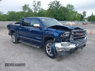 2016 GMC Sierra 1500 SLT with VIN 3GTU2NEC3GG146703, listed as a IAAI auction lot 42337945 with 128,410 mi miles and . Bid and sale history available at DreamBid. Image 1.