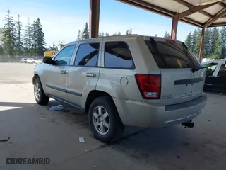 2008 Jeep Grand Cherokee Laredo with VIN 1J8GR48K18C222454, listed as a IAAI auction lot 42047541 with 180,145 mi miles. Bid and sale history available at carsss.com. Image 3.