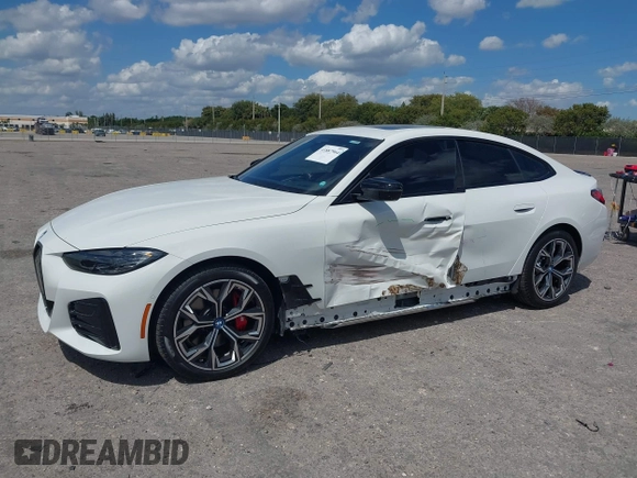 2024 BMW i4 eDrive35 z VIN WBY43AW02RFS79370, wystawiony jako IAAI lot #41887964 z przebiegiem 11 910 mil mil oraz . Historia ofert i sprzedaży dostępna na DreamBid. Obrazek 21.