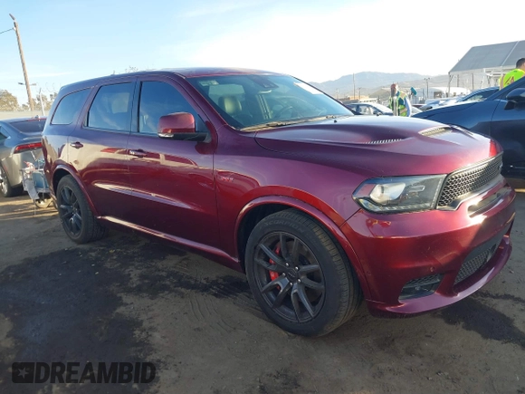 2019 Dodge Durango SRT with VIN 1C4SDJGJXKC556870, listed as a IAAI auction lot 41125324 with 16,857 mi miles and . Bid and sale history available at DreamBid. Image 1.