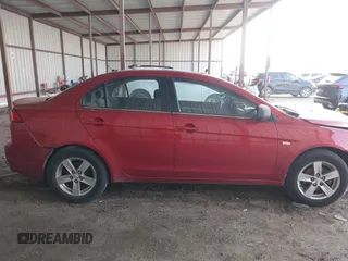 2008 Mitsubishi Lancer DE z VIN JA3AU26U28U042624, wystawiony jako IAAI lot #42257243 z przebiegiem 144 862 mil mil oraz . Historia ofert i sprzedaży dostępna na DreamBid. Obrazek 13.