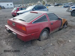 1988 Nissan 300ZX z VIN JN1HZ14S0JX271792, wystawiony jako IAAI lot #41457761 z przebiegiem Nie podano mil oraz . Historia ofert i sprzedaży dostępna na DreamBid. Obrazek 4.