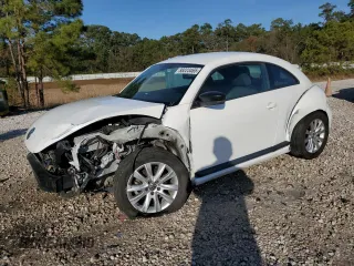 2014 Volkswagen Beetle Entry z VIN 3VWF17AT4EM643574, wystawiony jako Copart lot #88223465 z przebiegiem Nie podano mil oraz Szkoda całkowita • Salvage title. Historia ofert i sprzedaży dostępna na DreamBid. Obrazek 1.
