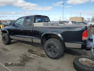 1999 Dodge Dakota SLT with VIN 1B7GG22Y5XS107729, listed as a Copart auction lot 79440034 with 163,718 mi miles and Salvage Title. Bid and sale history available at DreamBid. Image 2.