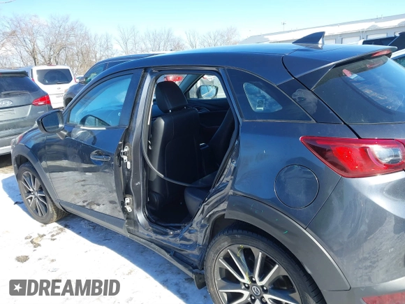 2017 Mazda CX-3 Touring with VIN JM1DKFC72H0167205, listed as a IAAI auction lot 41333632 with 106,063 mi miles. Bid and sale history available at carsss.com. Image 6.