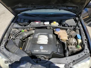 2000 Volkswagen Passat GLS z VIN WVWMD23B0YP307525, wystawiony jako Copart lot #57040775 z przebiegiem 167 440 mil mil oraz Szkoda całkowita • Salvage title. Historia ofert i sprzedaży dostępna na DreamBid. Obrazek 11.
