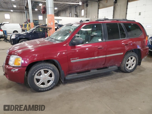2006 GMC Envoy SLE with VIN 1GKDT13S062263876, listed as a Copart auction lot 60245185 with 156,567 mi miles and Clean title. Bid and sale history available at DreamBid. Image 1.