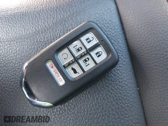 2024 Honda Odyssey Touring with VIN 5FNRL6H82RB027601, listed as a IAAI auction lot 41808680 with 25,911 mi miles and . Bid and sale history available at DreamBid. Image 11.