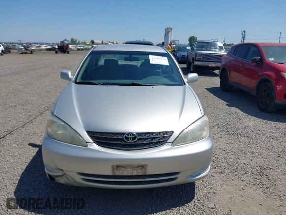 2004 Toyota Camry LE with VIN 4T1BE32K74U365621, listed as a IAAI auction lot 42459170 with 236,485 mi miles and . Bid and sale history available at DreamBid. Image 6.