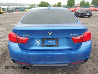 2016 BMW 4 Series 428i xDrive with VIN WBA4C9C54GG137283, listed as a IAAI auction lot 42330374 with 133,277 mi miles and . Bid and sale history available at DreamBid. Image 15.