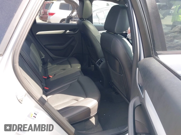 2018 Audi Q3 Premium with VIN WA1ECCFS0JR022112, listed as a IAAI auction lot 42356014 with 56,671 mi miles and . Bid and sale history available at DreamBid. Image 8.