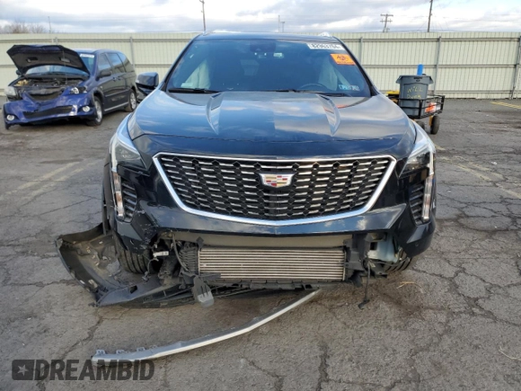 2021 Cadillac XT4 AWD Premium Luxury with VIN 1GYFZDR4XMF016846, listed as a Copart auction lot 82963704 with 44,063 mi miles and Salvage Title. Bid and sale history available at carsss.com. Image 5.