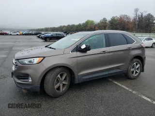 2019 Ford Edge SEL z VIN 2FMPK4J9XKBB11309, wystawiony jako Copart lot #56588705 z przebiegiem 66 998 mil mil oraz Szkoda całkowita • Salvage title. Historia ofert i sprzedaży dostępna na DreamBid. Obrazek 1.
