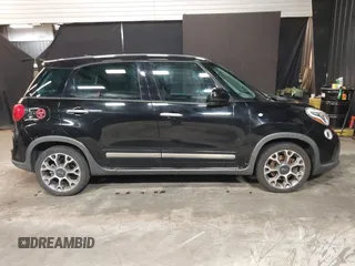 2014 FIAT 500L Trekking with VIN ZFBCFADHXEZ021414, listed as a IAAI auction lot 41596017 with 103,953 mi miles and . Bid and sale history available at DreamBid. Image 13.