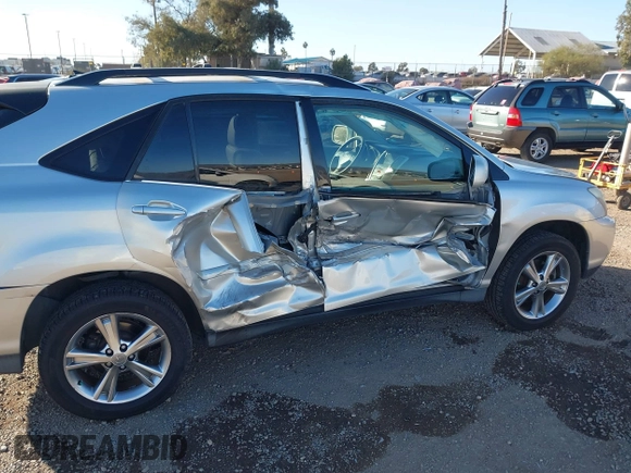 2006 Lexus RX 400h with VIN JTJHW31U560026104, listed as a IAAI auction lot 41311951 with 246,861 mi miles and . Bid and sale history available at DreamBid. Image 6.