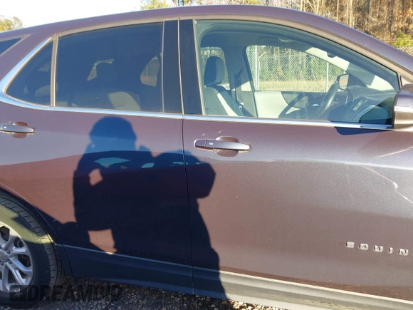 2019 Chevrolet Equinox LT z VIN 3GNAXKEVXKL243487, wystawiony jako IAAI lot #41217077 z przebiegiem 62 119 mil mil oraz . Historia ofert i sprzedaży dostępna na DreamBid. Obrazek 14.