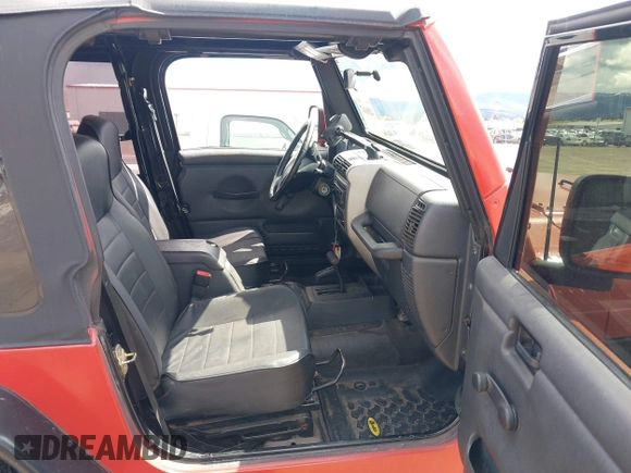 2005 Jeep Wrangler X with VIN 1J4FA39S35P358201, listed as a IAAI auction lot 42080407 with 130,110 mi miles. Bid and sale history available at carsss.com. Image 5.