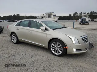 2014 Cadillac XTS Premium with VIN 2G61P5S32E9195930, listed as a Copart auction lot 48320165 with 31,026 mi miles and Salvage Title. Bid and sale history available at DreamBid. Image 4.
