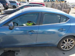 2018 Mazda 3 Touring with VIN 3MZBN1V38JM206827, listed as a IAAI auction lot 41983631 with 51,303 mi miles and . Bid and sale history available at DreamBid. Image 14.