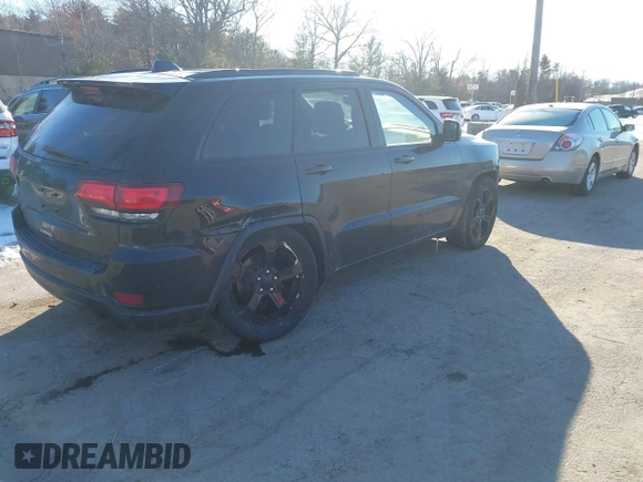 2018 Jeep Grand Cherokee Laredo E with VIN 1C4RJFAGXJC375588, listed as a IAAI auction lot 41406344 with 69,989 mi miles. Bid and sale history available at carsss.com. Image 4.