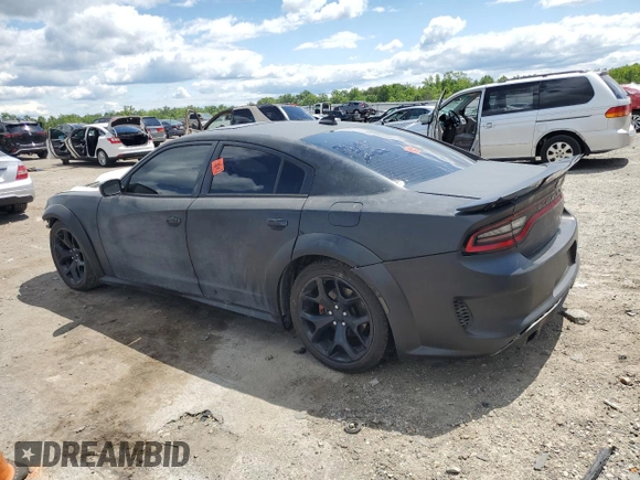 2015 Dodge Charger RT with VIN 2C3CDXCT9FH784672, listed as a Copart auction lot 58190615 with 121,033 mi miles and Salvage title. Bid and sale history available at DreamBid. Image 2.