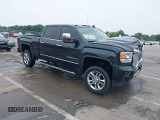 2017 GMC Sierra 2500HD Denali with VIN 1GT12UEY9HF107061, listed as a IAAI auction lot 42492536 with 180,148 mi miles and . Bid and sale history available at DreamBid. Image 1.