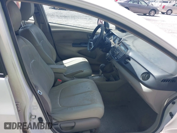 2010 Honda Insight EX with VIN JHMZE2H70AS008996, listed as a IAAI auction lot 42181399 with 359,468 mi miles and . Bid and sale history available at DreamBid. Image 5.