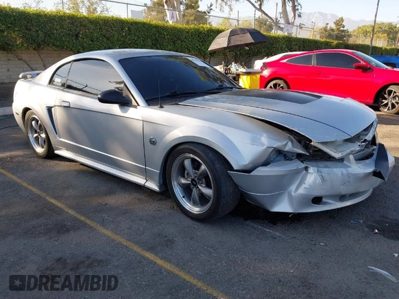 2004 Ford Mustang Standard with VIN 1FAFP40434F100991, listed as a IAAI auction lot 40706520 with 93,130 mi miles. Bid and sale history available at carsss.com. Image 1.