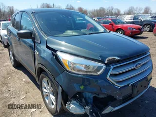 2019 Ford Escape SE z VIN 1FMCU9GDXKUC06609, wystawiony jako IAAI lot #42061974 z przebiegiem 148 064 mil mil oraz . Historia ofert i sprzedaży dostępna na DreamBid. Obrazek 6.
