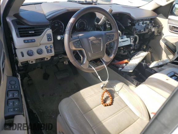 2015 GMC Yukon Denali z VIN 1GKS2CKJ9FR622342, wystawiony jako Copart lot #53671555 z przebiegiem Nie podano mil oraz Czysty tytuł • Clean title. Historia ofert i sprzedaży dostępna na DreamBid. Obrazek 8.