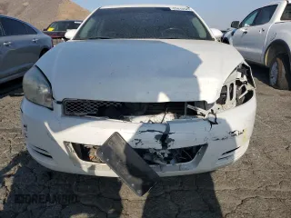 2014 Chevrolet Impala LT with VIN 2G1WB5E3XE1128402, listed as a Copart auction lot 63413525 with 101,161 mi miles and Salvage title. Bid and sale history available at DreamBid. Image 5.