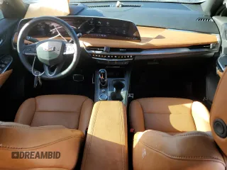 2024 Cadillac XT4 FWD Sport with VIN 1GYFZER40RF249101, listed as a Copart auction lot 76312304 with 1,969 mi miles and Salvage title. Bid and sale history available at DreamBid. Image 8.