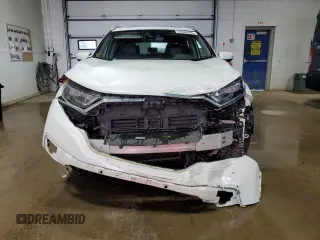 2021 Honda CR-V Touring z VIN 7FART6H97ME005163, wystawiony jako Copart lot #57688485 z przebiegiem 79 137 mil mil oraz Szkoda całkowita • Salvage title. Historia ofert i sprzedaży dostępna na DreamBid. Obrazek 5.